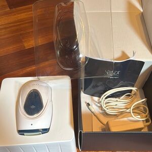 Sensica permanent hair removal device in box with directions